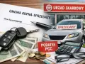 Umowa kupna-sprzedaży samochodu, kluczyki, pieniądze i tabliczka "Podatek PCC" przed Urzędem Skarbowym. Rozliczanie podatku od kupna auta online.