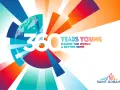 360 lat Saint-Gobain: "Making the World a Better Home". Kolorowa grafika z globusem i promieniami.