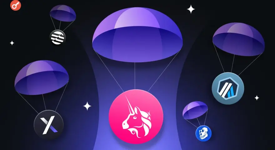 Co to jest airdrop kryptowaluty? Ilustracja pokazuje kilka tokenów kryptowalutowych spadających na spadochronach, symbolizując darmowe rozdawanie cyfrowych aktywów.